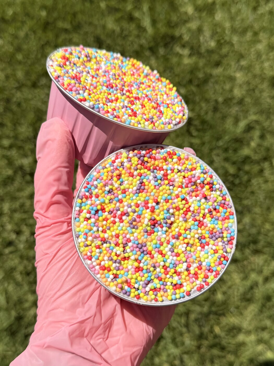 Dot Cake covered in rainbow sprinkles